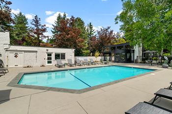Sparkling outdoor pool at the lakes apartments in bellevue, wa 98007